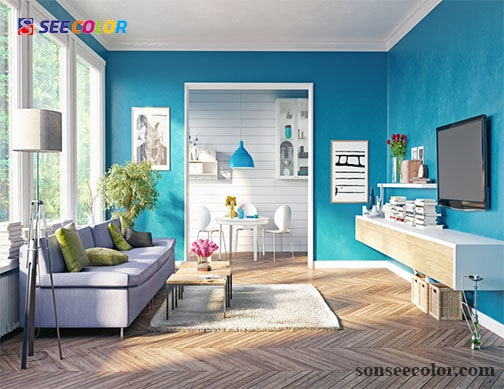 Phòng khách sơn màu xanh dương nổi bật hơn với trần màu trắng 